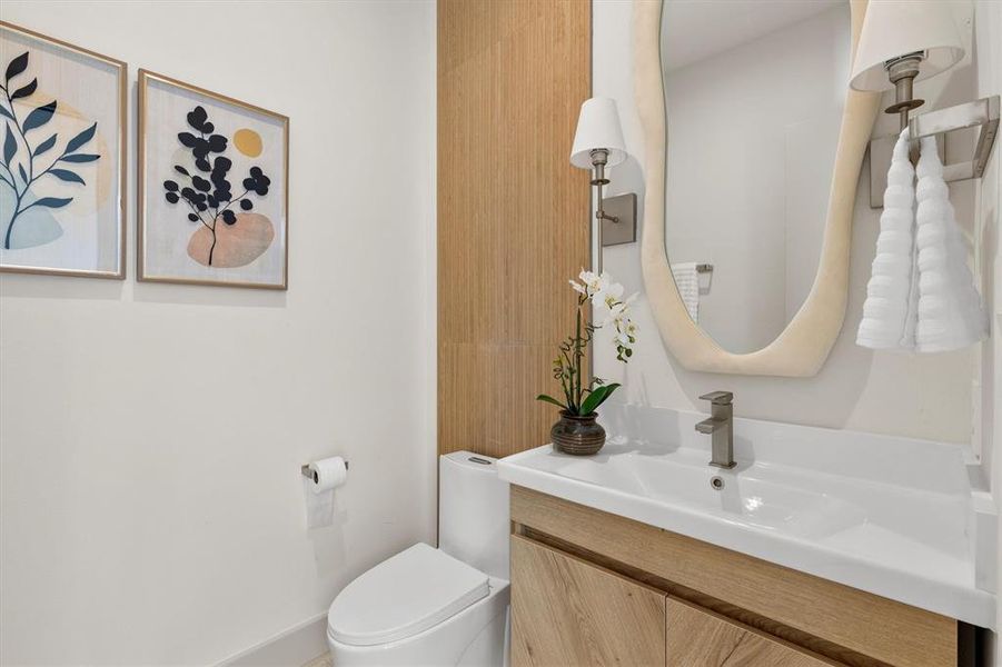 Bathroom with vanity and toilet