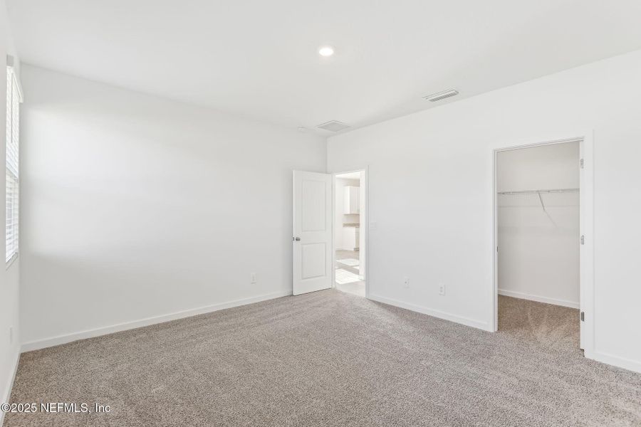 Spacious, unfurnished interior of a new home in Lakes at Bella Lago - Signature Series, Green Cove Springs (Image 28). Spacious, unfurnished interior of a new home in Lakes at Bella Lago - Signature Series, Green Cove Springs (Image 28).