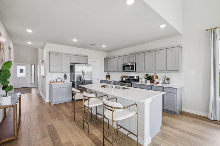 Kitchen in the Winters home plan by Trophy Signature Homes – REPRESENTATIVE PHOTO Kitchen in the Winters home plan by Trophy Signature Homes – REPRESENTATIVE PHOTO