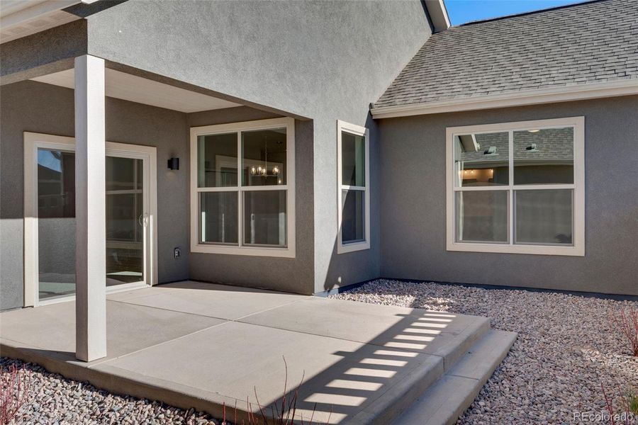 Exterior details and patio area of a home in The Courtyards at Lupton Village, Fort Lupton (Image 3).