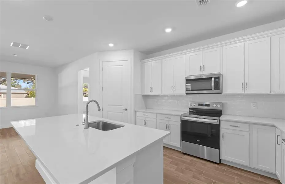 Furnished interior view inside a new home in Legacy Groves, Nokomis (Image 4).