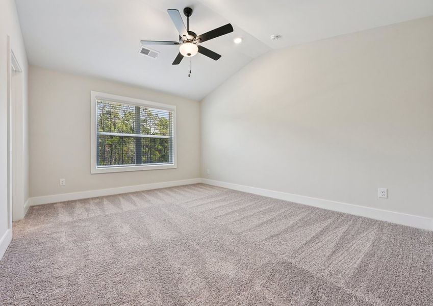 The upstairs loft is the perfect space for a play room or home office.
