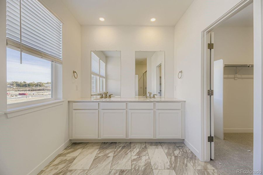 Furnished interior view inside a new home in Vermilion Creek, Centennial (Image 5).
