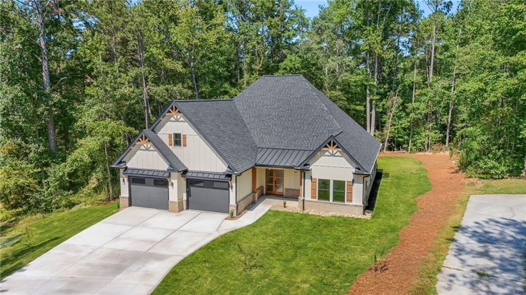 Front exterior of a new home in , Snellville, GA, highlighting curb appeal (Image 18).