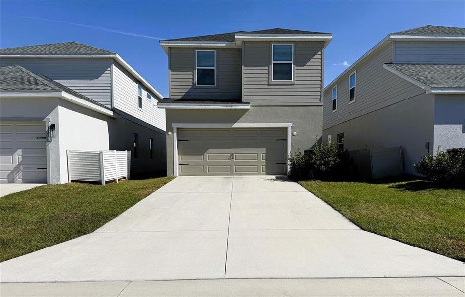 Front exterior of a new home in , St. Cloud, FL, highlighting curb appeal (Image 25). Front exterior of a new home in , St. Cloud, FL, highlighting curb appeal (Image 25).
