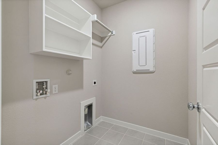 Utility Room in the Oak home plan by Trophy Signature Homes – REPRESENTATIVE PHOTO