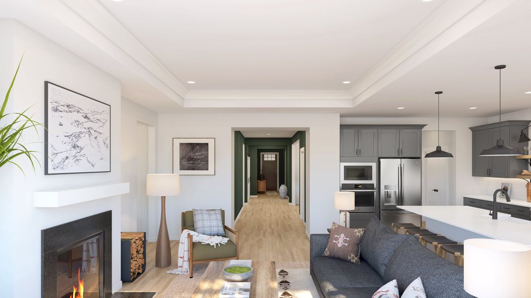 Great room with tray ceiling and fireplace Great room with tray ceiling and fireplace