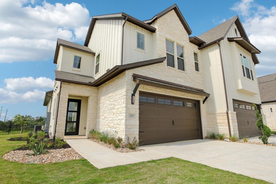 View of front of home featuring board and batten siding, an attached garage, driveway, stone siding, and roof with shingles View of front of home featuring board and batten siding, an attached garage, driveway, stone siding, and roof with shingles
