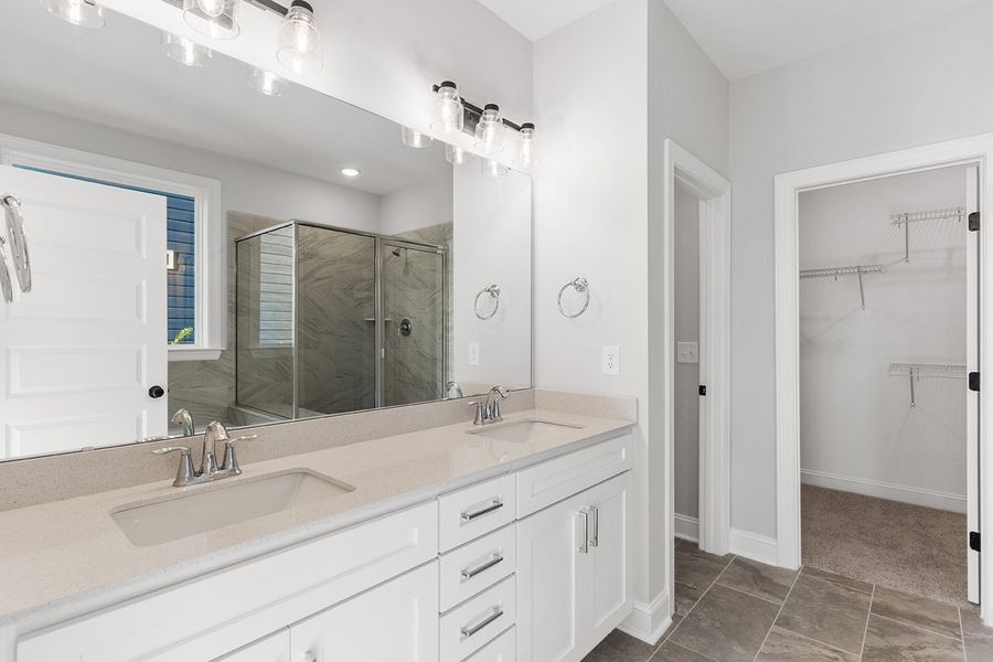 Representative furnished interior of a home built from the The Chandler by RobuckHomes in Windwater, Hampstead (Image 14).