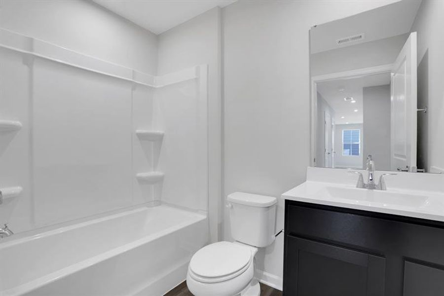 Furnished interior view inside a new home in Summertree, Stone Mountain (Image 9).