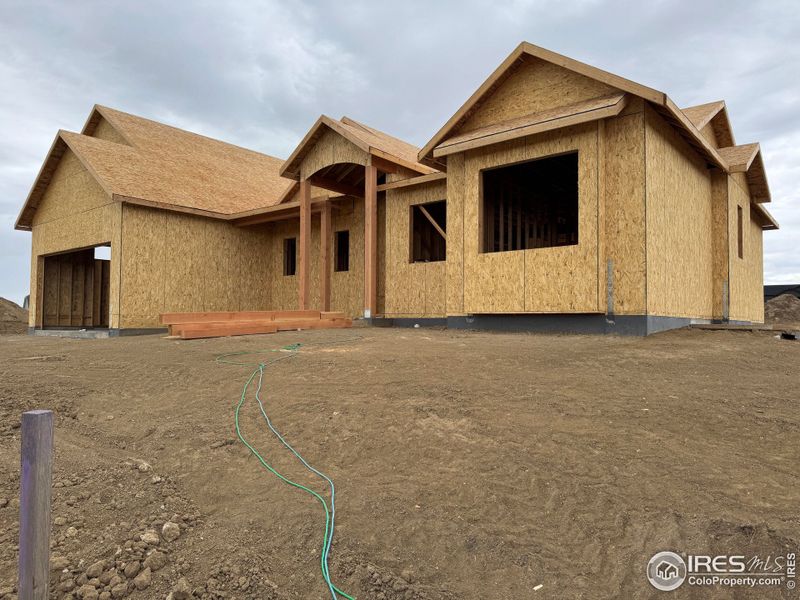 Front exterior of a new home in , Severance, CO, highlighting curb appeal (Image 7). Front exterior of a new home in , Severance, CO, highlighting curb appeal (Image 7).