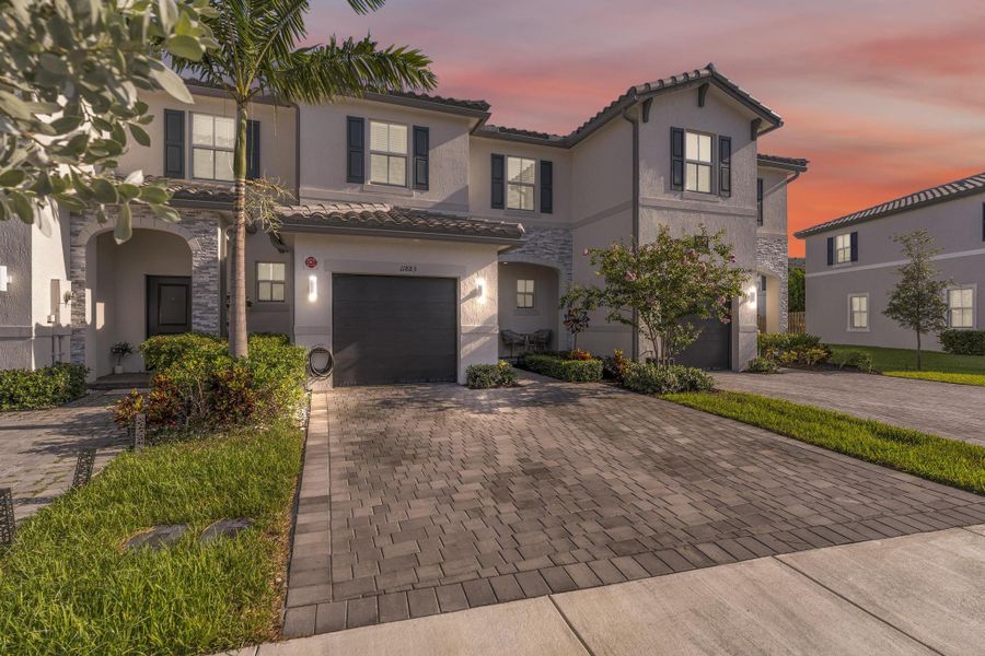 Front exterior of a new home in , Coral Springs, FL, highlighting curb appeal (Image 22).