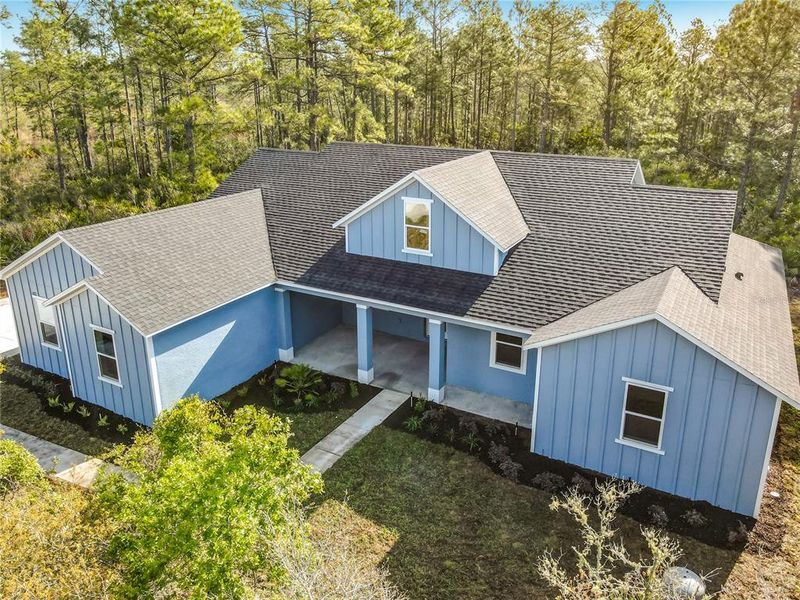 Front exterior of a new home in , Eustis, FL, highlighting curb appeal (Image 24).