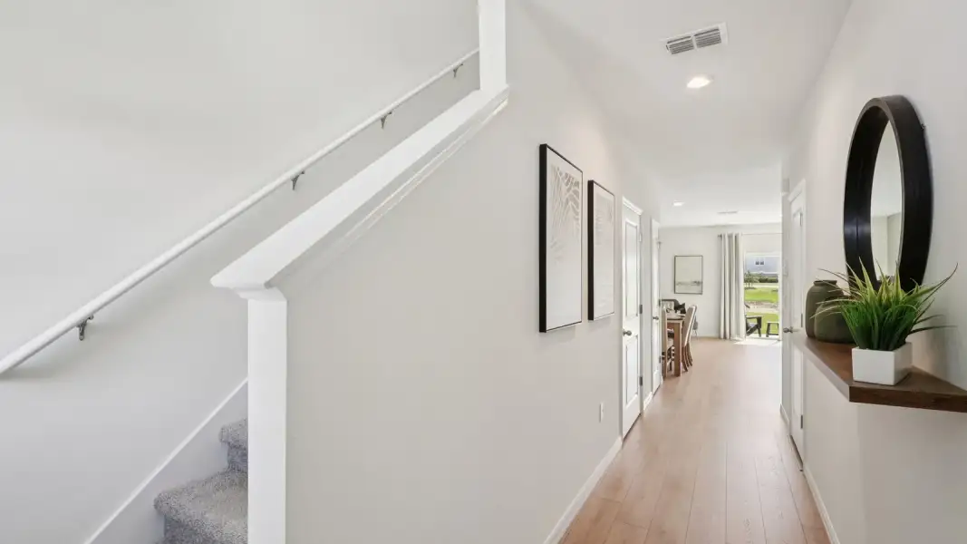 Furnished interior view inside a new home in Towns at Woodsdale, Wesley Chapel (Image 7).