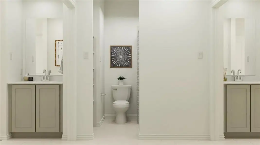 Dual vanities featuring light gray cabinetry and white countertops Dual vanities featuring light gray cabinetry and white countertops