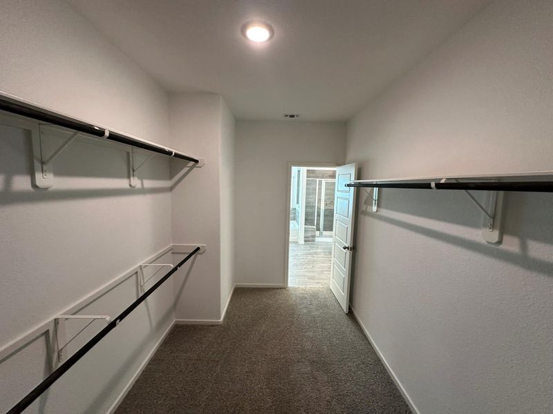 Spacious, unfurnished interior of a new home in , Iowa Colony (Image 20).