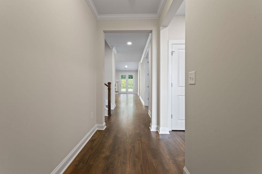 Spacious, unfurnished interior of a new home in Tidewater at Lakes of Cane Bay, Summerville (Image 14).