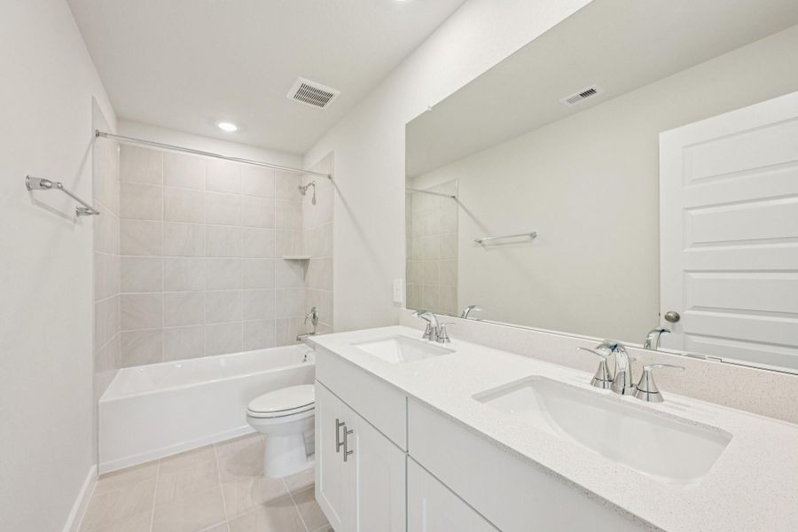 Furnished interior view inside a new home in Landing Meadows - Traditional Series, New Caney (Image 10). Furnished interior view inside a new home in Landing Meadows - Traditional Series, New Caney (Image 10).