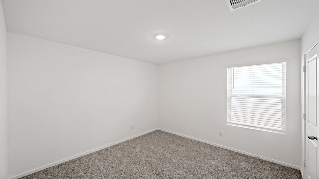 Spacious, unfurnished interior of a new home in Bridges on Lake Houston Villas, Humble (Image 12).