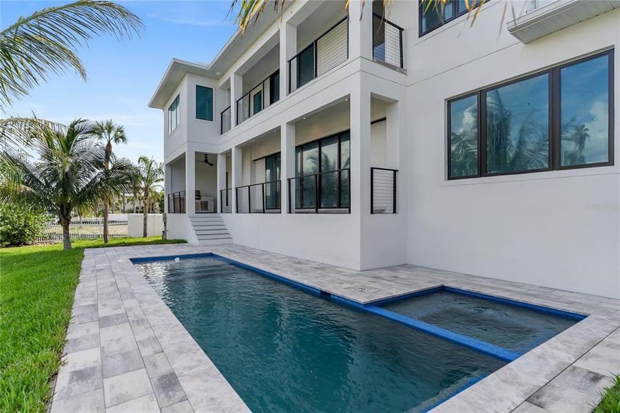 Front exterior of a new home in , Longboat Key, FL, highlighting curb appeal (Image 27). Front exterior of a new home in , Longboat Key, FL, highlighting curb appeal (Image 27).