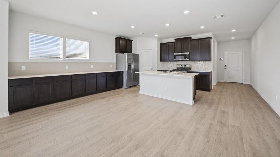 Representative furnished interior of a home built from the Oakridge by D.R. Horton in Morning Ridge, Princeton (Image 5).