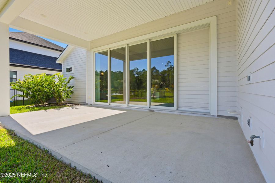 Exterior details and patio area of a home in West End at Town Center, Ponte Vedra (Image 27). Exterior details and patio area of a home in West End at Town Center, Ponte Vedra (Image 27).