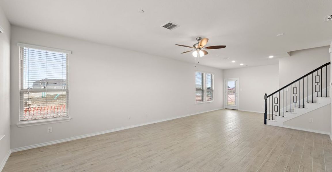 Representative exterior photo of a completed home built from the Caddo by Impression Homes in Creekshaw, Royse City, TX (Image 11).