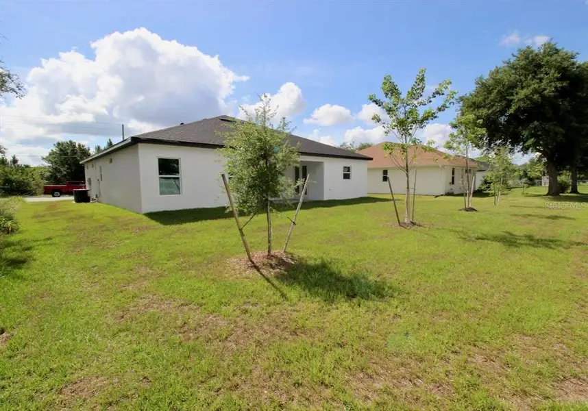 Exterior details and patio area of a home in , Port Charlotte (Image 3).