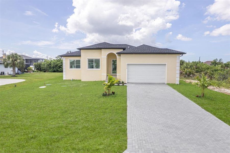 Front exterior of a new home in , Port Charlotte, FL, highlighting curb appeal (Image 30). Front exterior of a new home in , Port Charlotte, FL, highlighting curb appeal (Image 30).