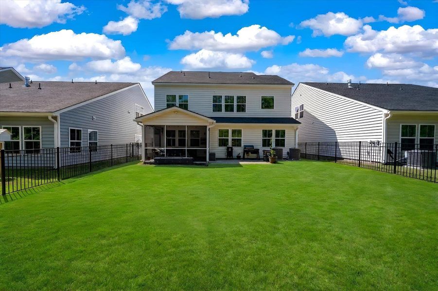Exterior details and patio area of a home in , Johns Island (Image 28).