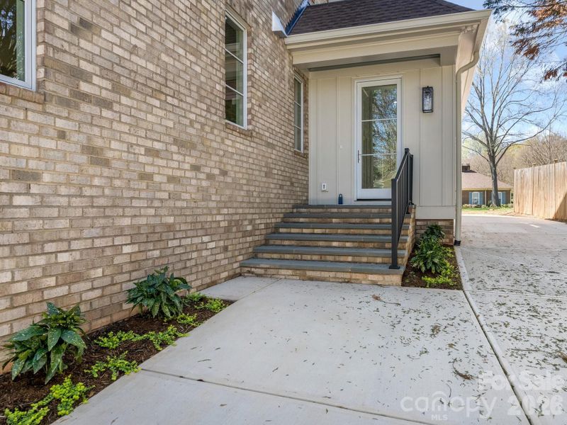 Exterior details and patio area of a home in , Charlotte (Image 27).