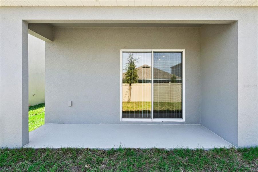 Exterior details and patio area of a home in , Port Orange (Image 2).