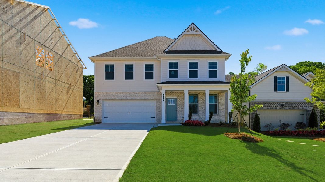 Representative exterior photo of a completed home built from the Wynwood by DRB Homes in Abbotts Crossing, Conyers, GA (Image 24).