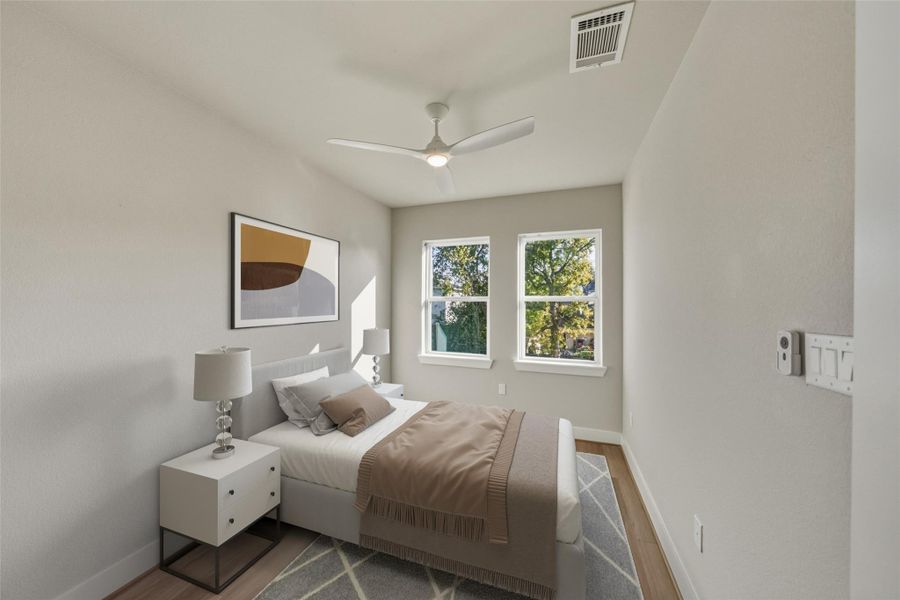 This bedroom features a modern, minimalist design with neutral tones. Virtually staged, creating a serene atmosphere.