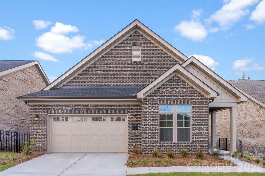 Front exterior of a new home in The Courtyards on New Hope, Gastonia, NC, highlighting curb appeal (Image 19). Front exterior of a new home in The Courtyards on New Hope, Gastonia, NC, highlighting curb appeal (Image 19).