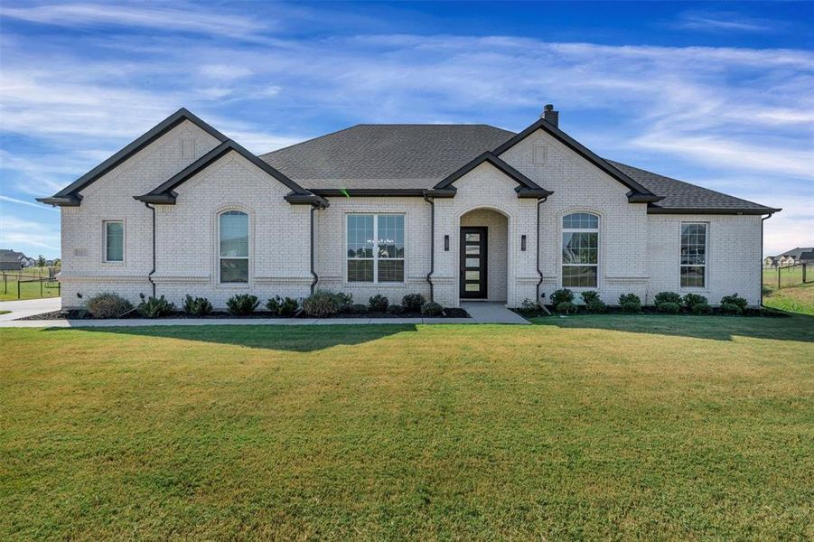 Exterior details and patio area of a home in , Godley (Image 26).