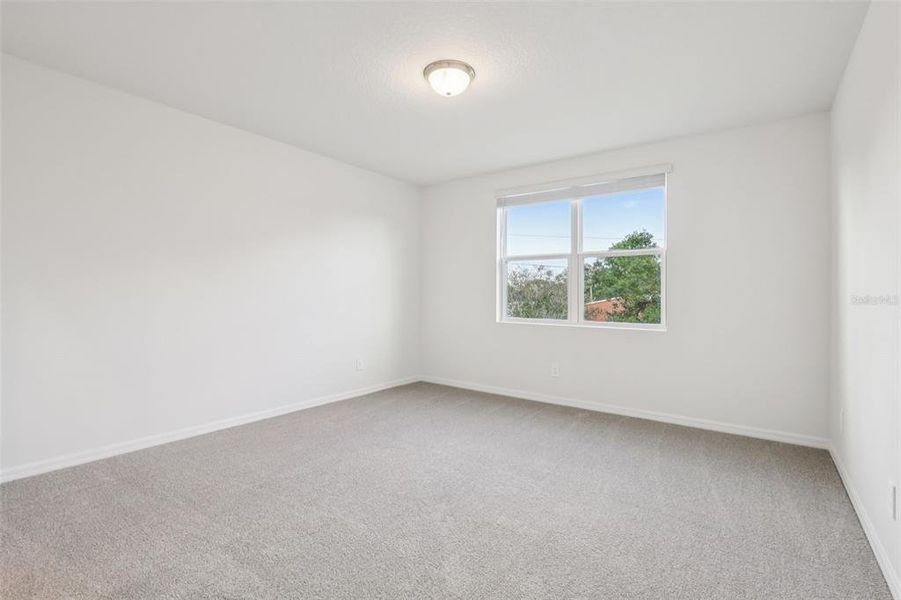 Spacious, unfurnished interior of a new home in Crosswinds - Signature Series, Haines City (Image 24).