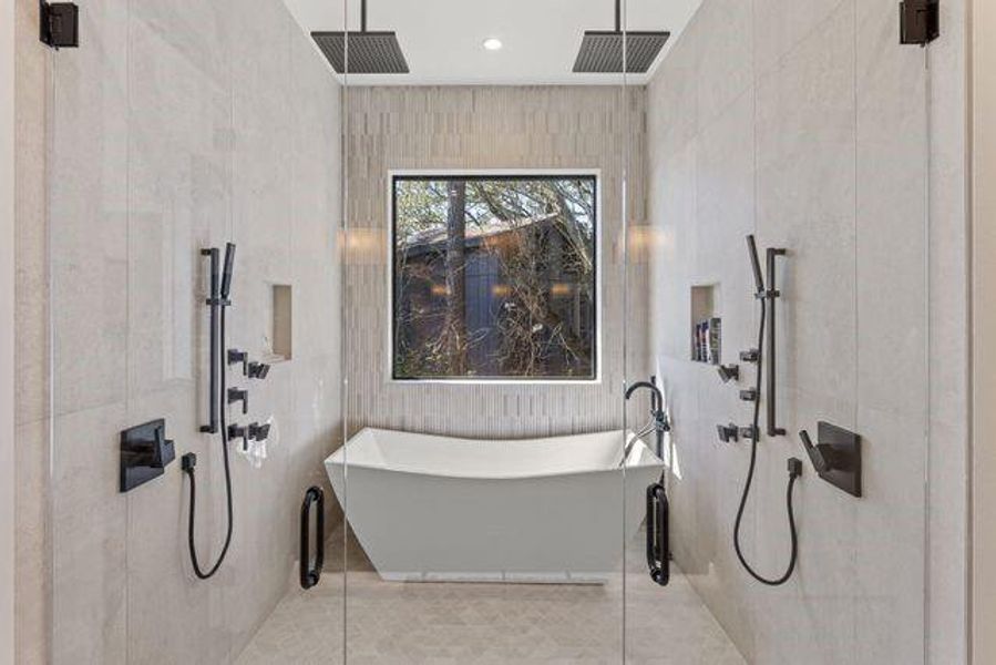 Full bathroom featuring tiled shower, a freestanding tub, tile patterned flooring, and recessed lighting