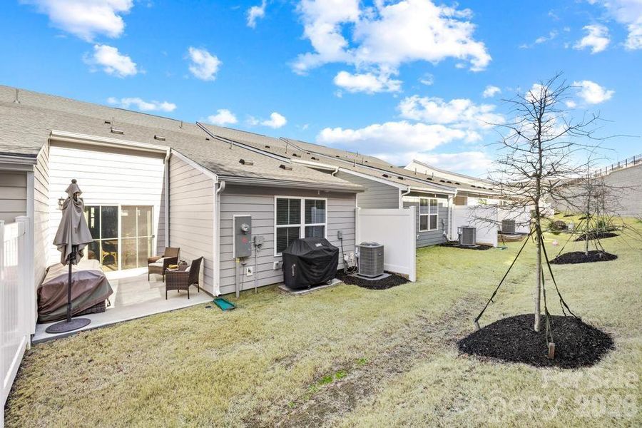 Exterior details and patio area of a home in , Troutman (Image 24).