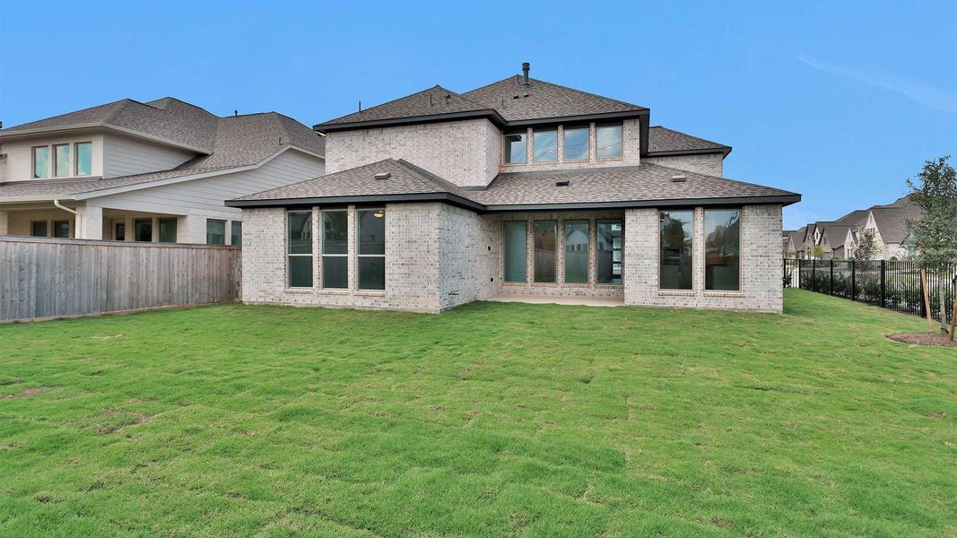 Exterior details and patio area of a home in Bridgeland, Cypress (Image 3).