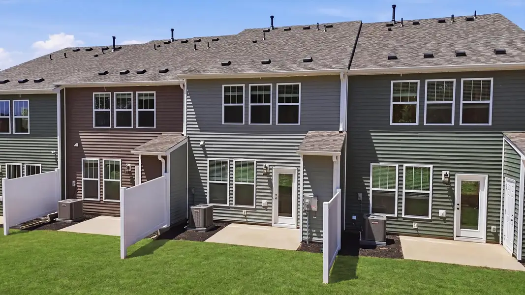 Highly functional backyard and patio add memorable living space to this elegant home located in Greenville, SC