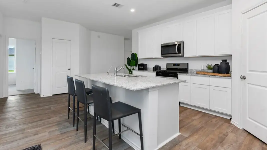 Furnished interior view inside a new home in Emberly, Beasley (Image 10).