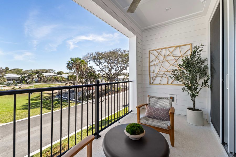 Exterior details and patio area of a home in EvenTide, New Smyrna Beach (Image 3).