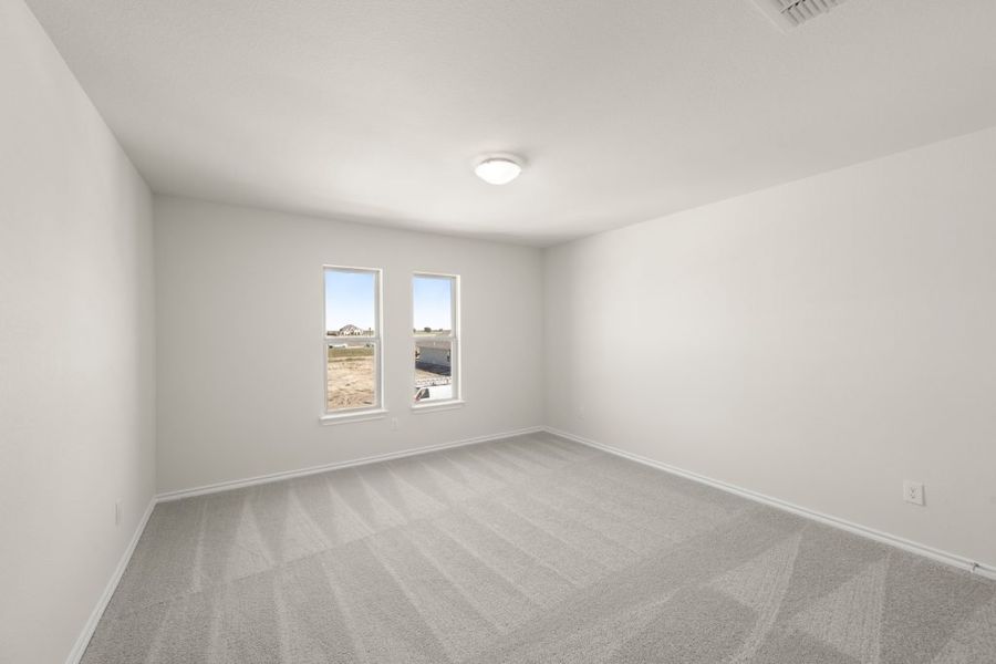 Front exterior of a new home in Myrtle Creek, Waxahachie, TX, highlighting curb appeal (Image 23). Front exterior of a new home in Myrtle Creek, Waxahachie, TX, highlighting curb appeal (Image 23).