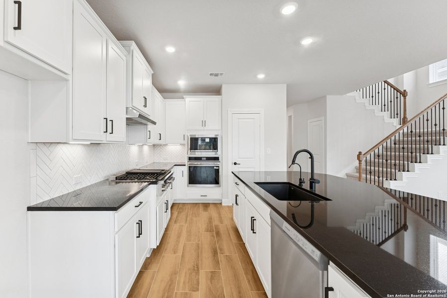 Furnished interior view inside a new home in Davis Ranch 50', San Antonio (Image 6).
