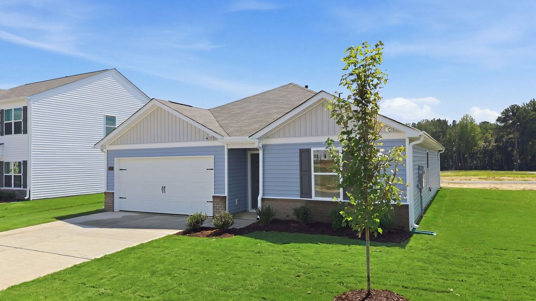 Front exterior of a new home in Hunter Hill, Rocky Mount, NC, highlighting curb appeal (Image 2). Front exterior of a new home in Hunter Hill, Rocky Mount, NC, highlighting curb appeal (Image 2).