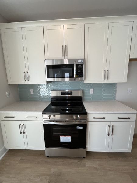 Furnished interior view inside a new home in River Tide Farms, Bolivia (Image 10).
