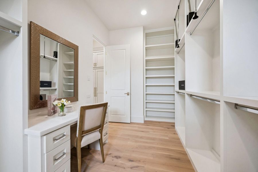 Example of second primary closet. **Photo is of another home in the community and for information purposes only. Buyer to verify all details.** Example of second primary closet. **Photo is of another home in the community and for information purposes only. Buyer to verify all details.**