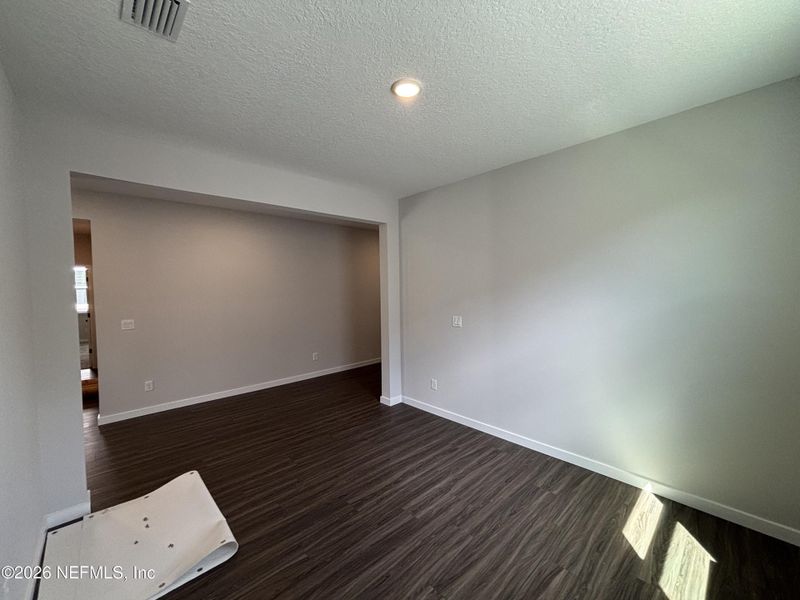 Spacious, unfurnished interior of a new home in The Cypress Series at Reserve East, Flagler Beach (Image 33).