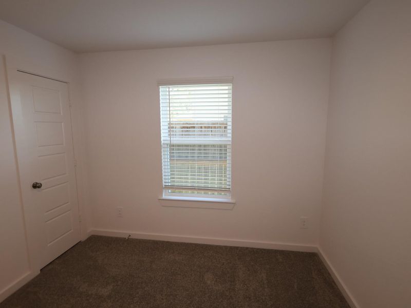 Spacious, unfurnished interior of a new home in Pinewood at Grand Texas, New Caney (Image 7).